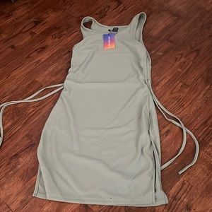 Large green summer dress with cinch straps